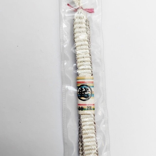 Himo sluiting voor haori handgeknoopte zijde met label