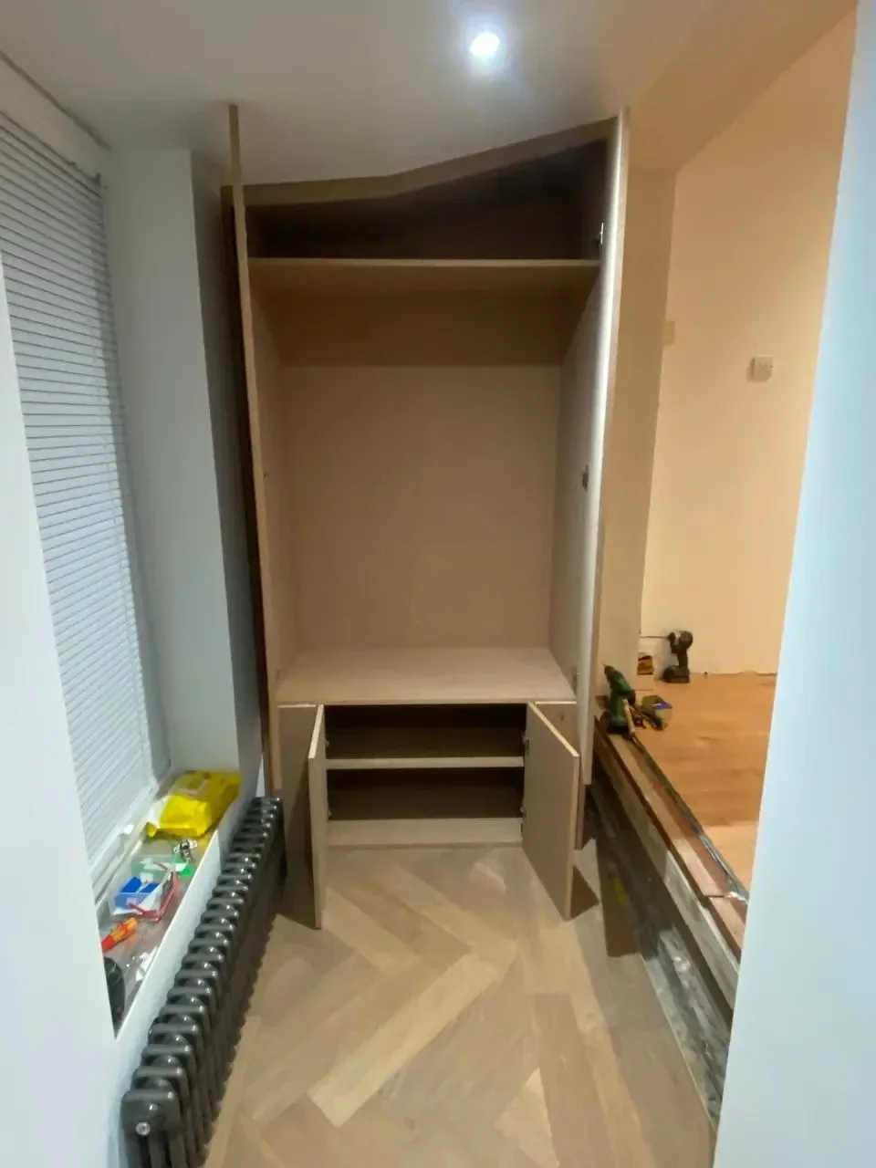Professional handyman doing household repairs