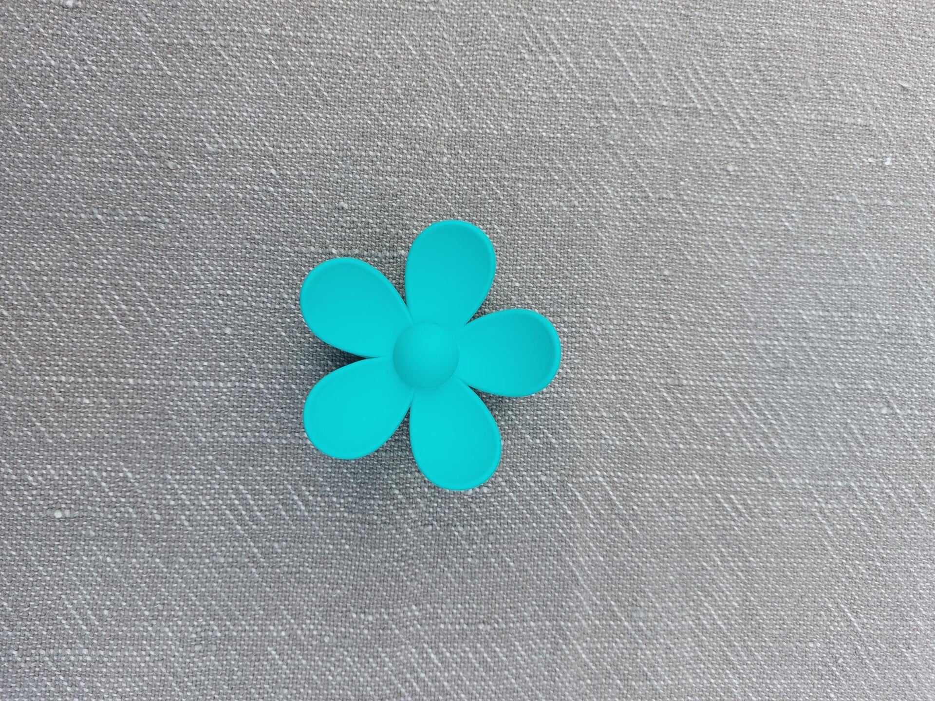 Haarklem bloem turquoise