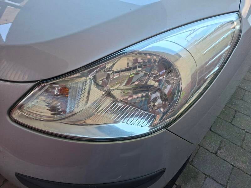 Heldere koplamp rechts na herstellen
