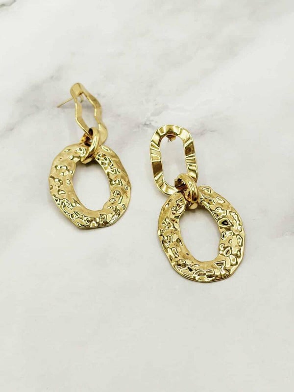 Boucle d'oreille martelée