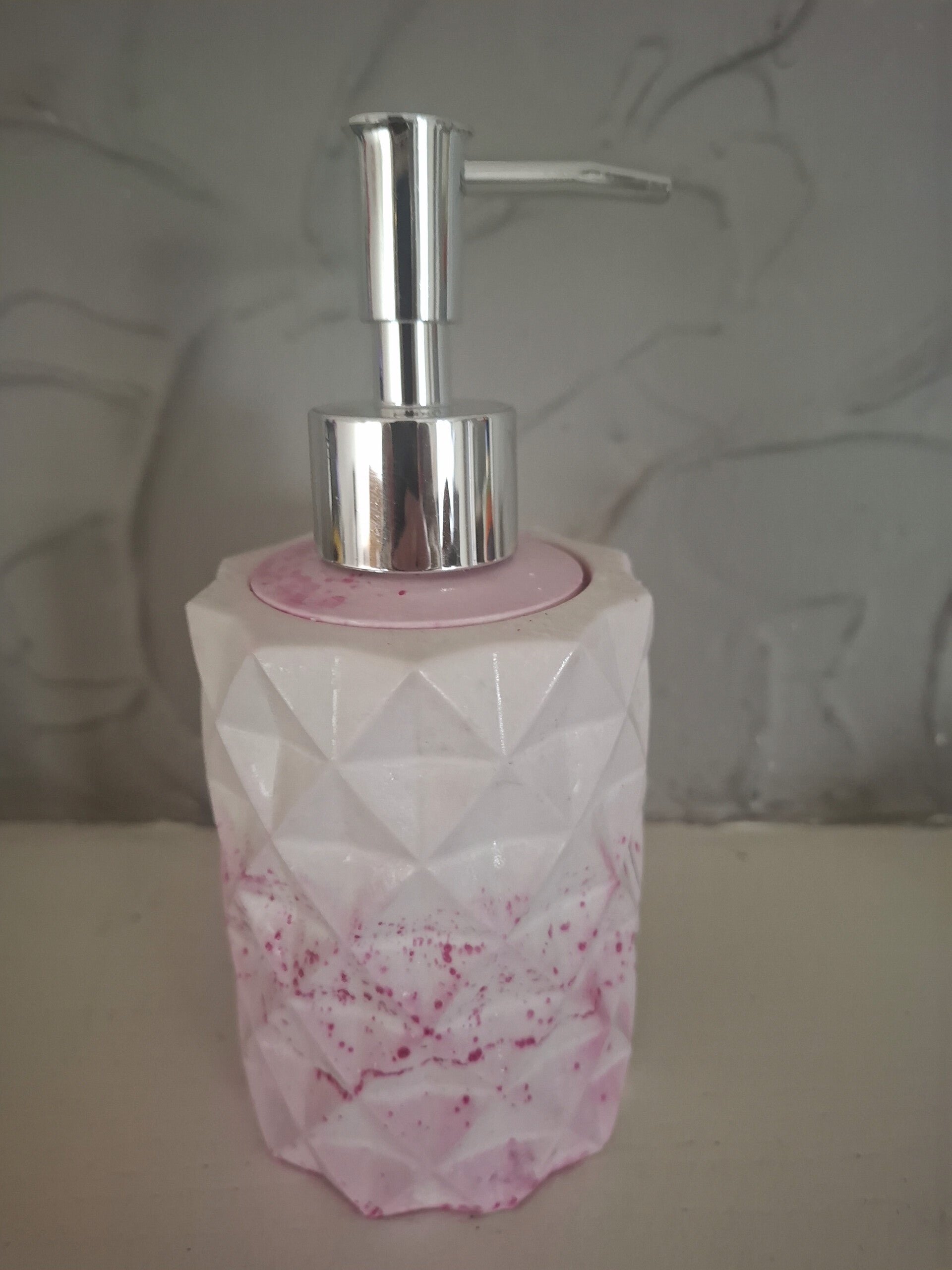 Porte savon liquide à  pompe.