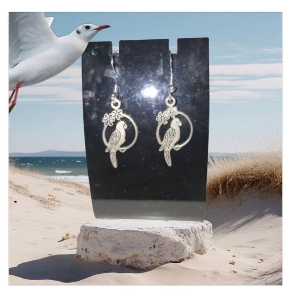 Boucles d'oreilles perroquet.