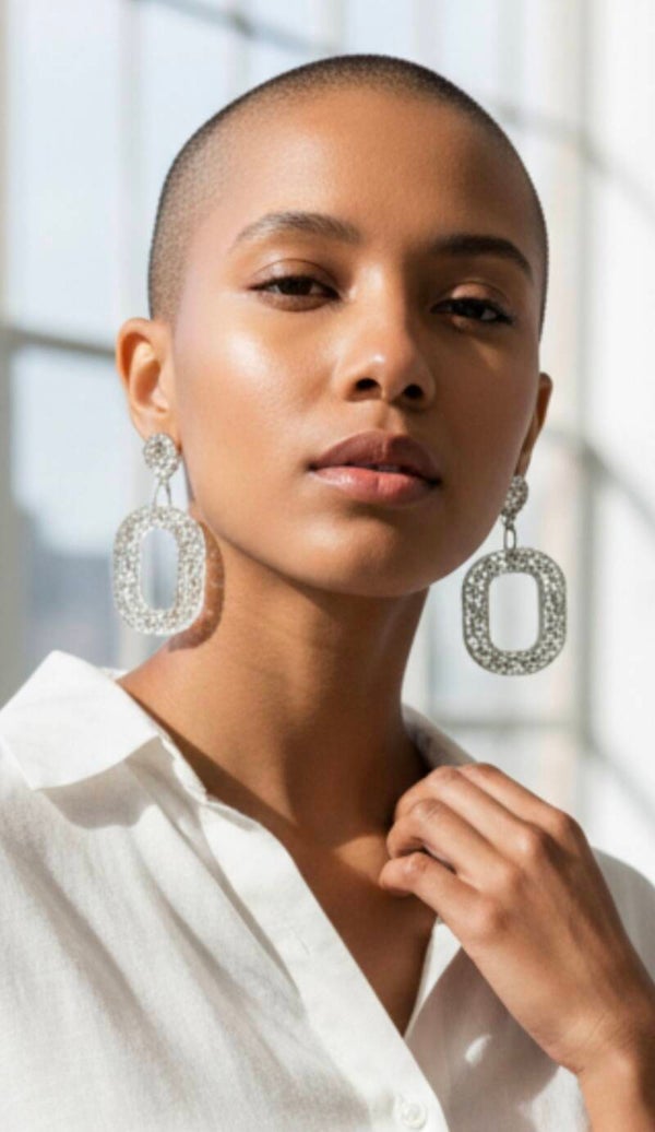 Boucles d'oreilles  orné  de perles argent.