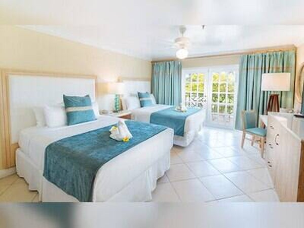 BAY GARDENS BEACH RESORT & SPA      Deluxe Garden or Deluxe Pool View Room Single/Double Occupancy Starting at