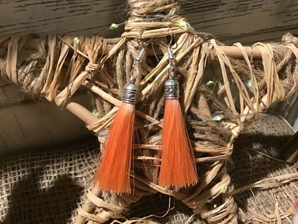 Boucles d’oreilles plumeau rose