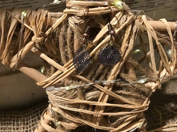 Boucles d’oreilles fleur noire