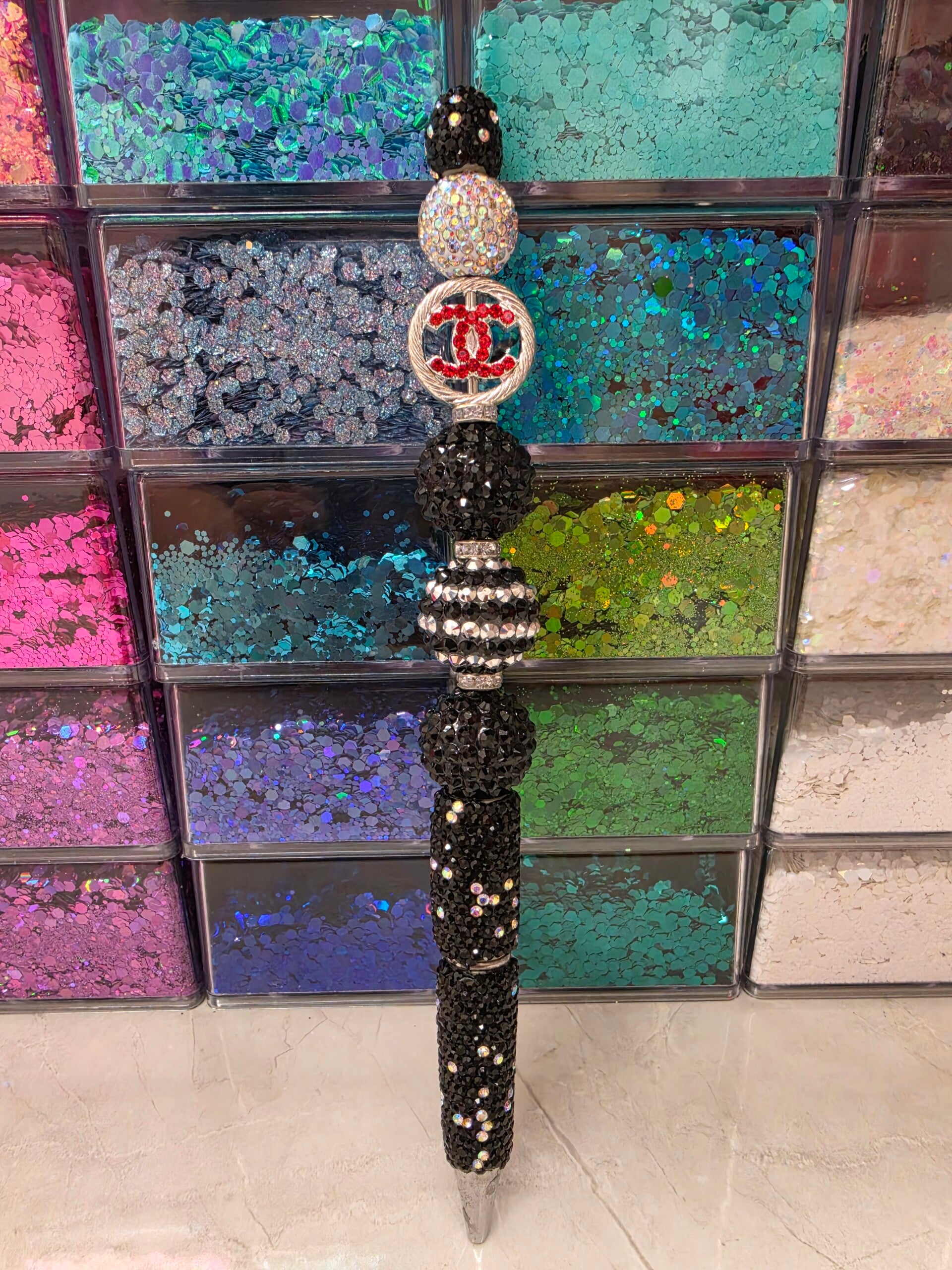 Sparkly black, silver and red Chanel pen