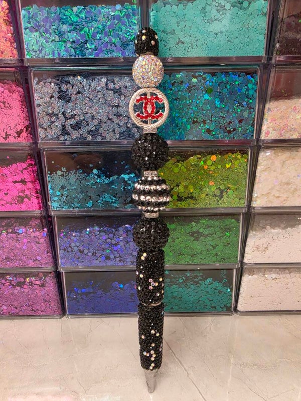 Sparkly black, silver and red Chanel pen