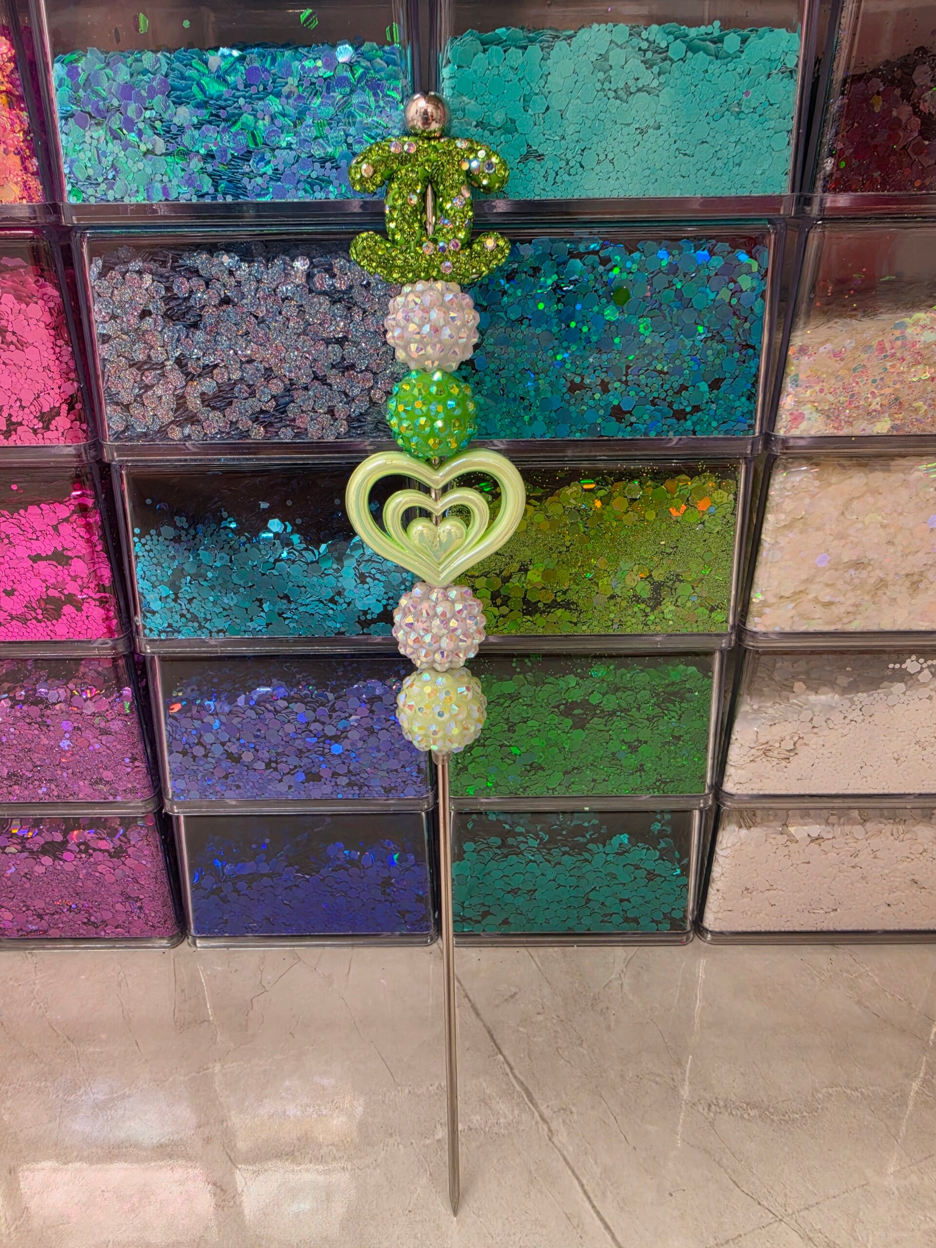 Chanel Sparkly green and white pokey tool