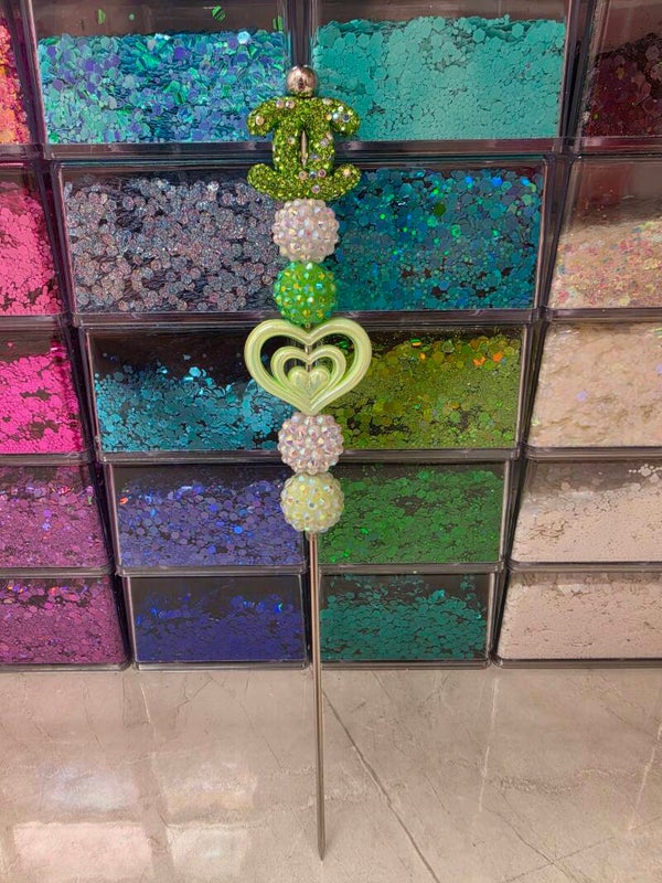 Chanel Sparkly green and white pokey tool