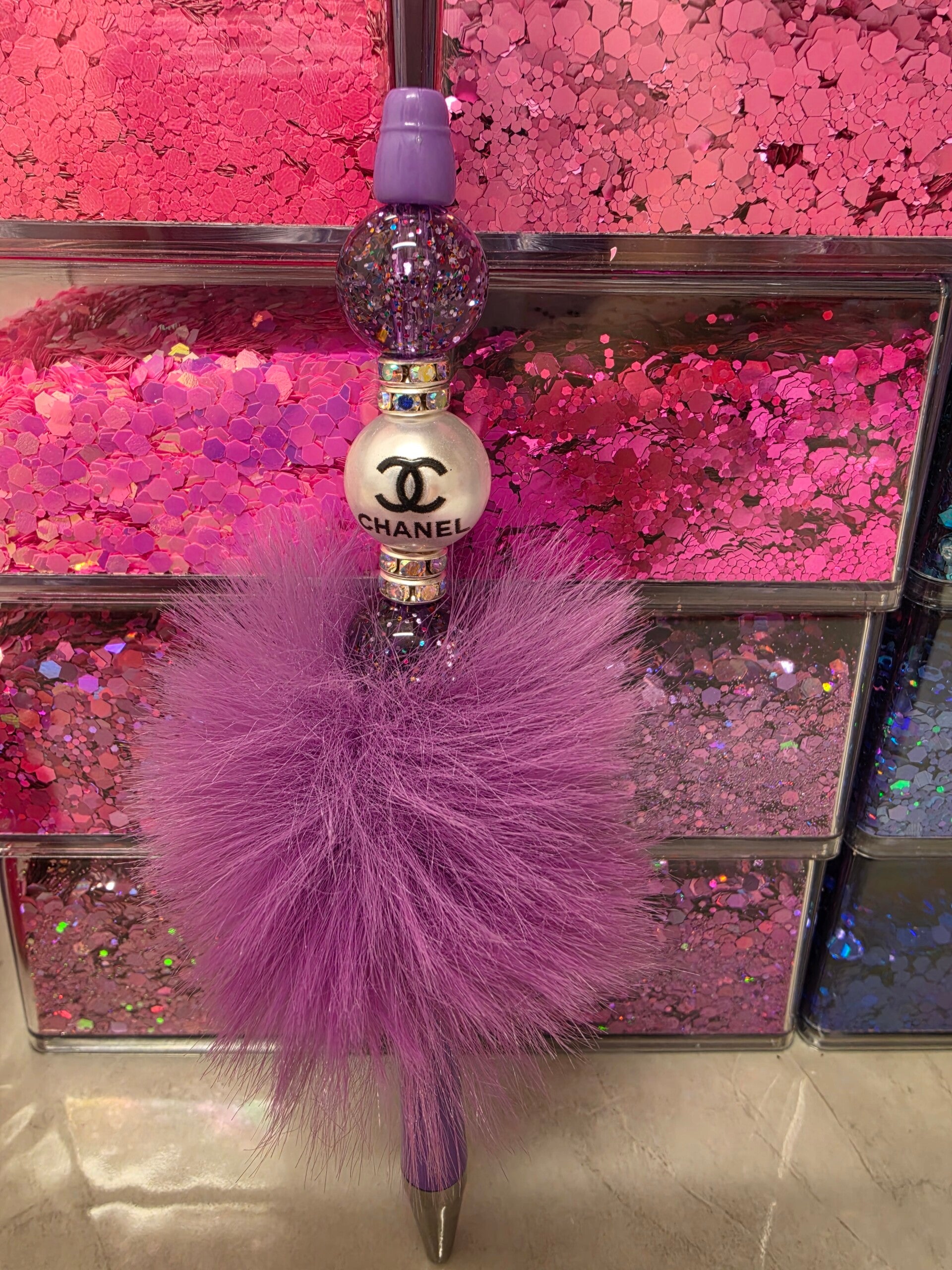 Fluffy purple Chanel pen