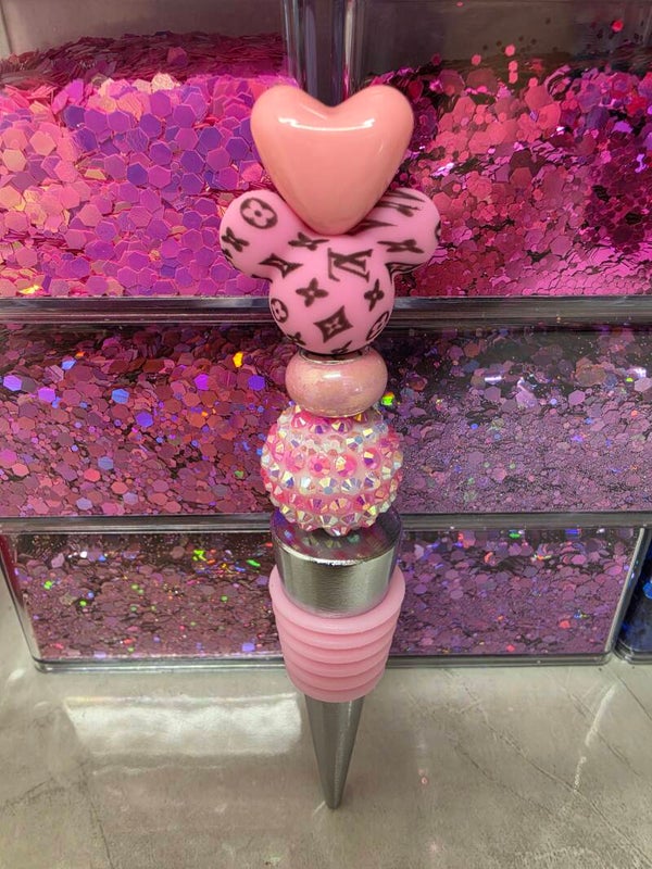Pink Minnie Louis Vuitton wine stopper with heart detail
