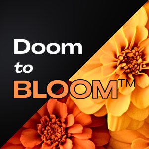 Photo of a black triangle resting on top of a triangle featuring blooming orange and yellow marigolds, with the words Doom to Bloom.