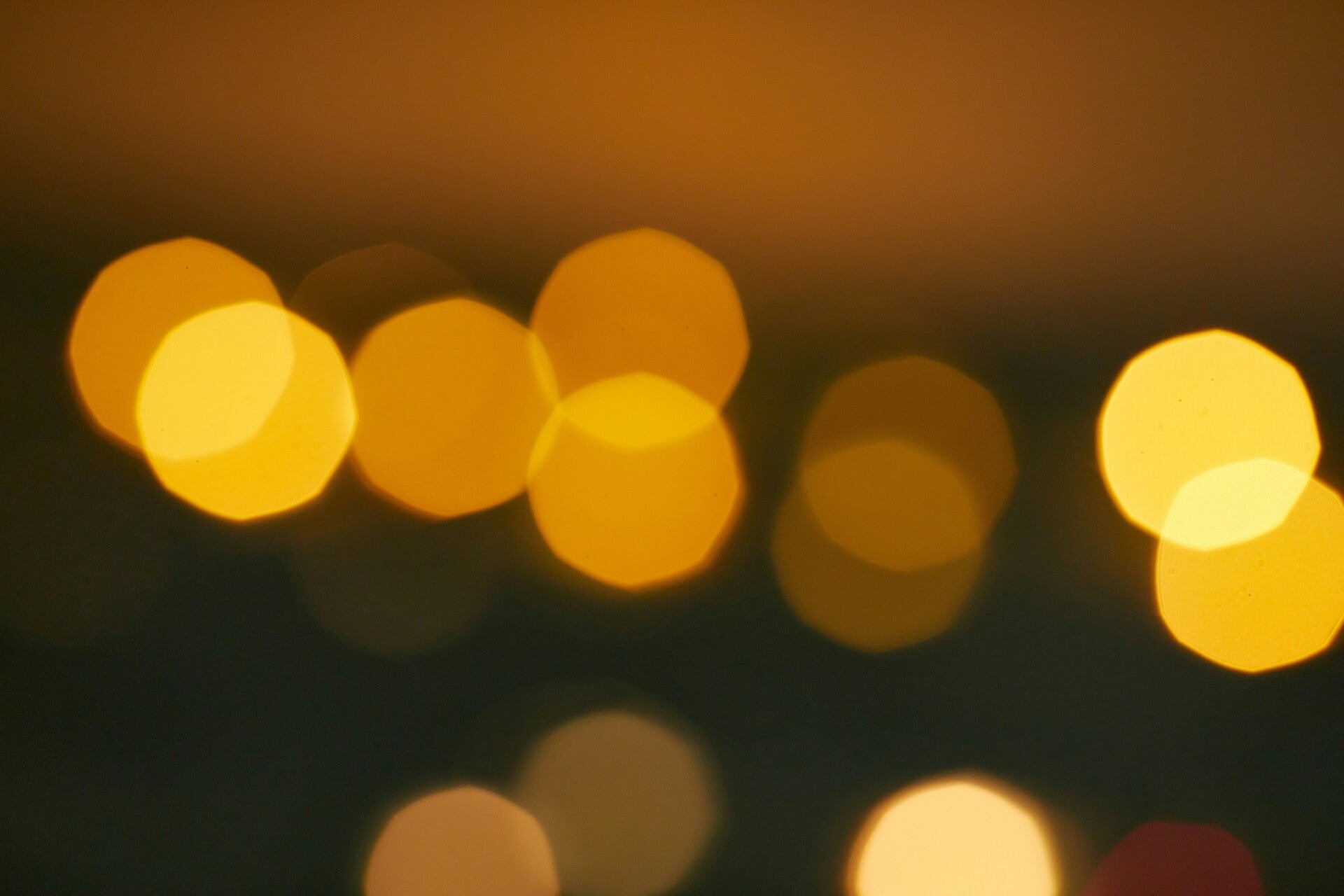 photo of yellow tone lights against dark background by Photo by Олег Мороз on Unsplash