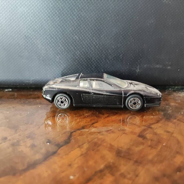 Ferrari Testarossa  noir 1/43 Burago