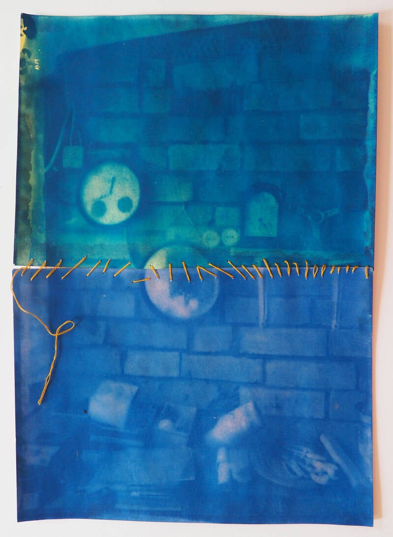 cyanotype op oranje en geel papier met geel borduurgaren, 21 x 29,7cm, 2026
