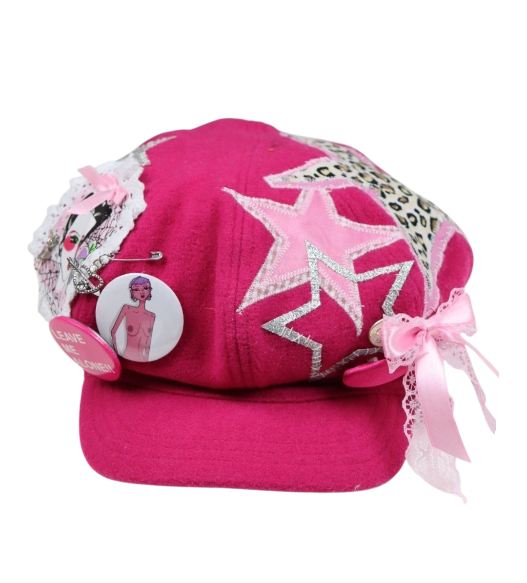 Pink newsboy cap with patches and buttons