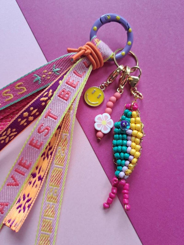 Bagcharm met steekmarkeerders vis Geel