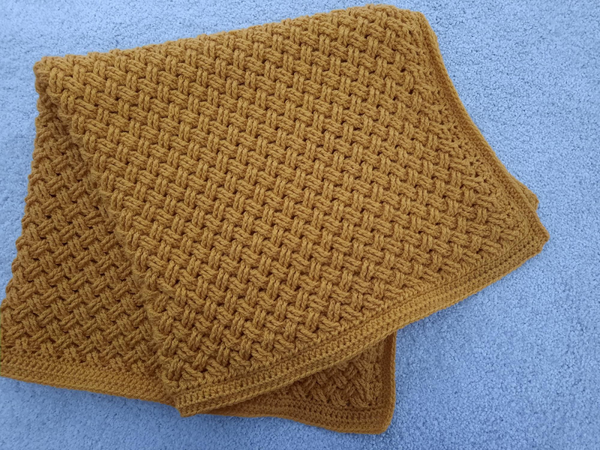 wiegdeken weefpatroon okergeel