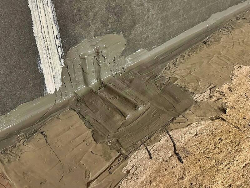It´s important to have the support brackets completely tanked in regards to Radon protection, as they have to be bolted down into the subfloor and penetrate the initial Radon barrier.
