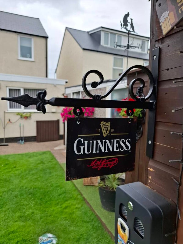 small bracket with guinness sign