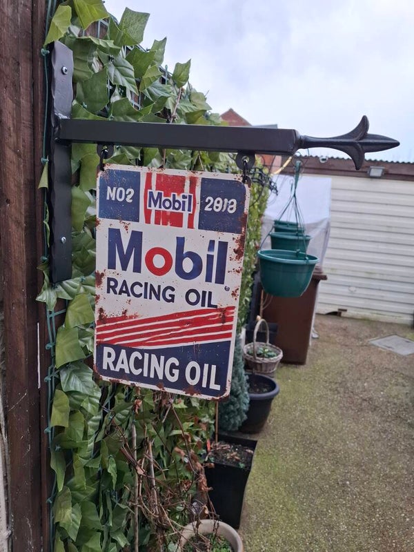 Retro mobil racing oil sign and bracket