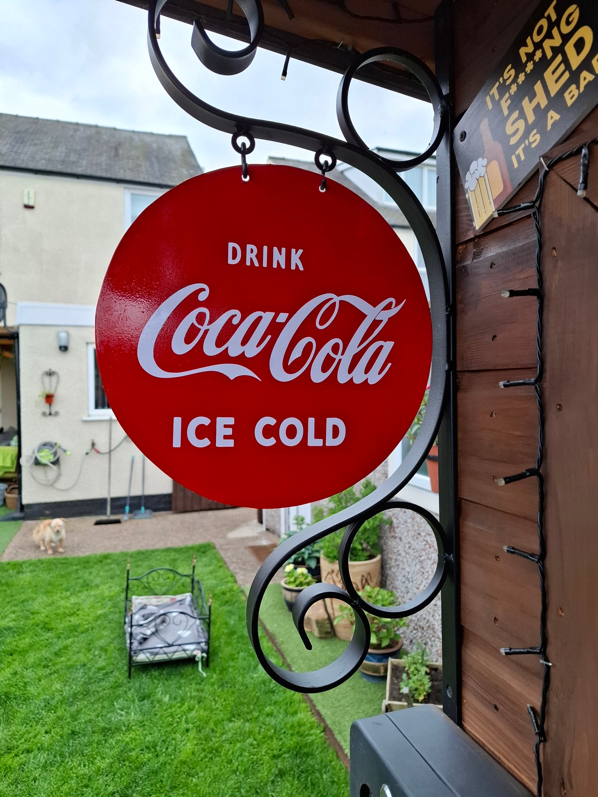Coca cola sign and bracket