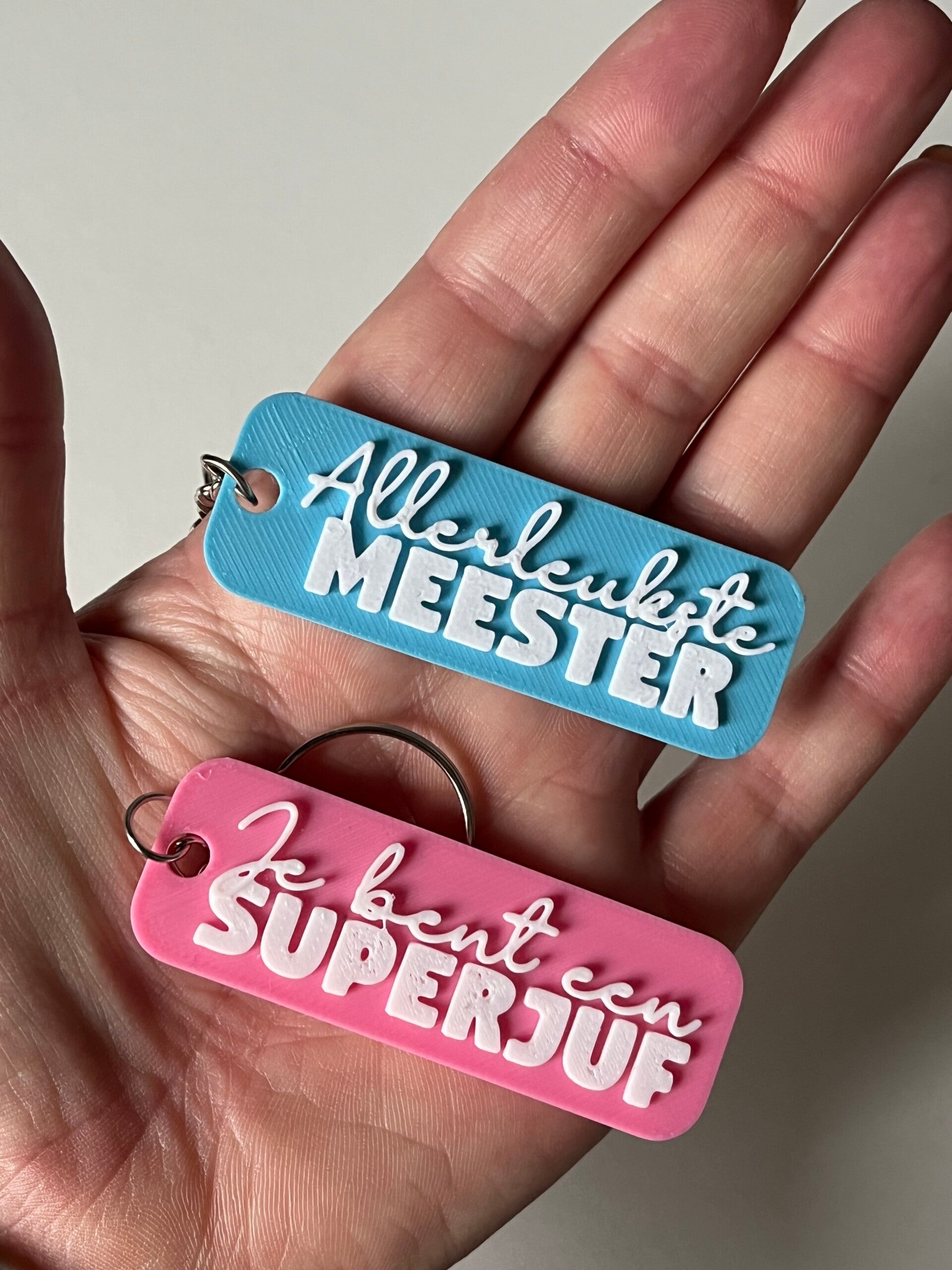 Sleutelhanger juf en meester
