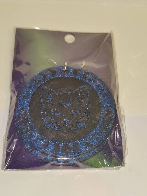 Korvakorut - kissa sini-musta