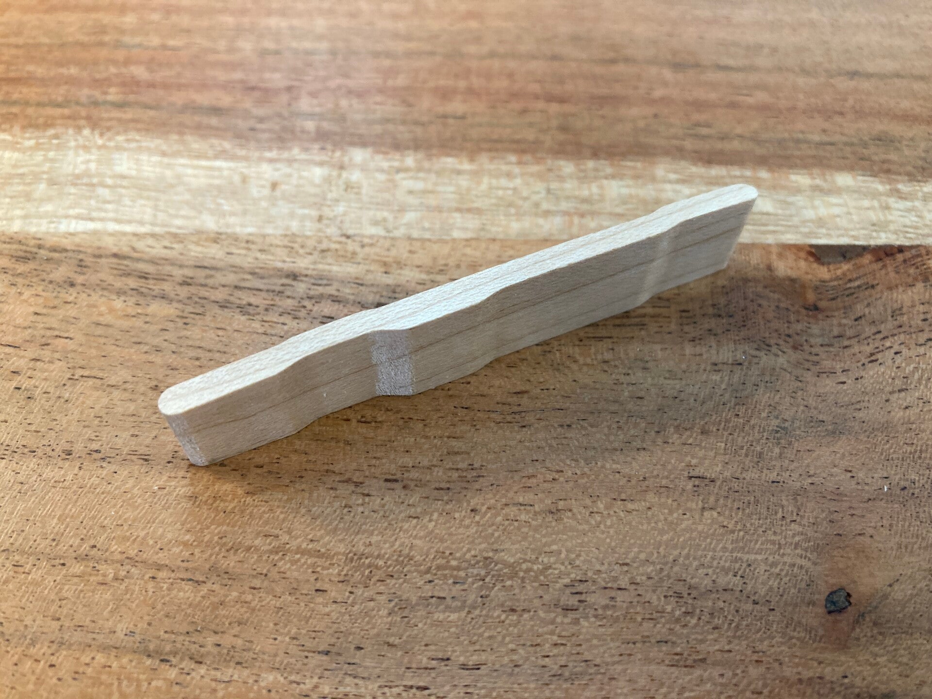 Tricone T-bar compensated saddle