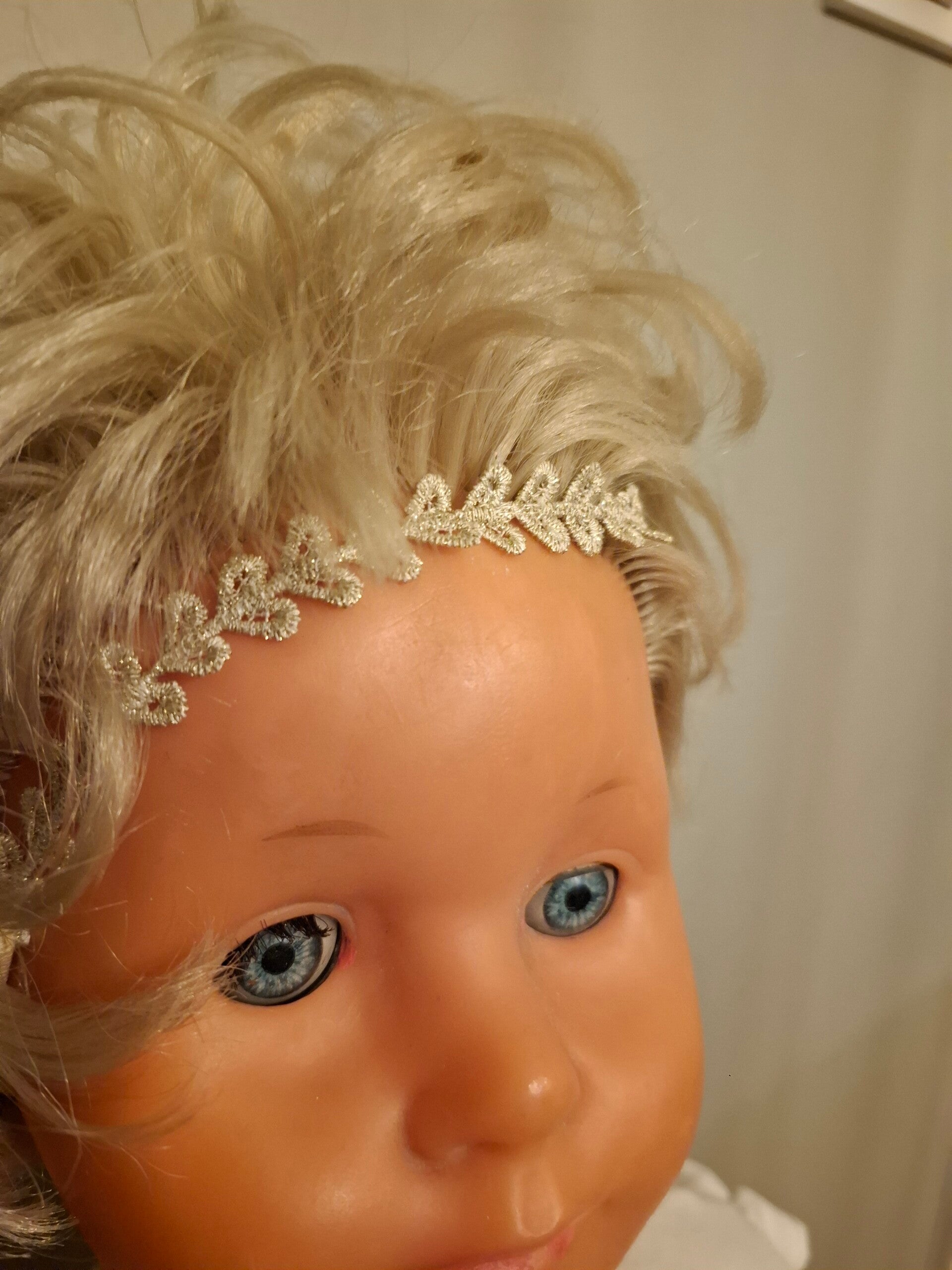 Haarband met gouden bloemblaadjes op tricotband