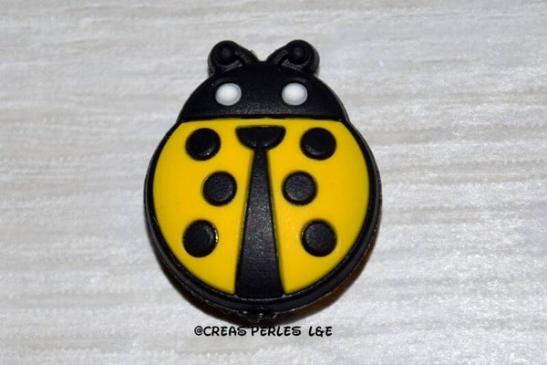 Coccinelle silicone jaune