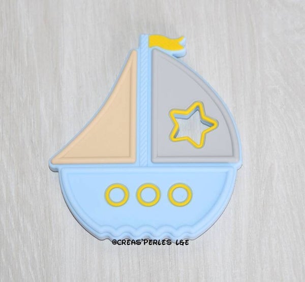 Anneau de dentition bateau bleu clair