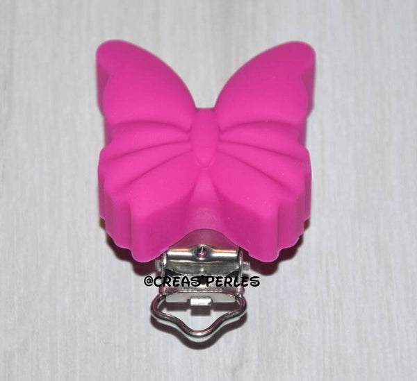 Clip silicone papillon rose fuchsia