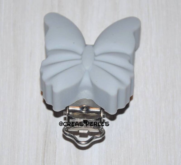 Clip silicone papillon gris clair