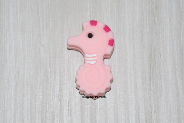 Hippocampe silicone rose clair