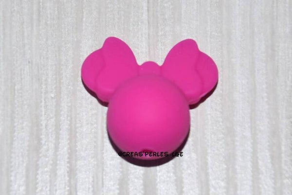 Souris noeud silicone rose fuchsia