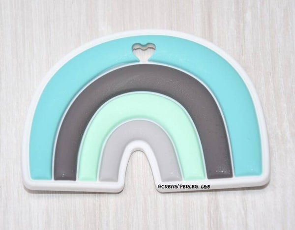 Anneau de dentition arc en ciel turquoise