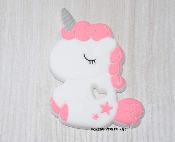 Anneau de dentition licorne rose corail