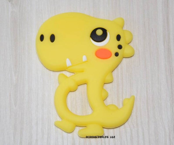 Anneau de dentition dinosaure A jaune