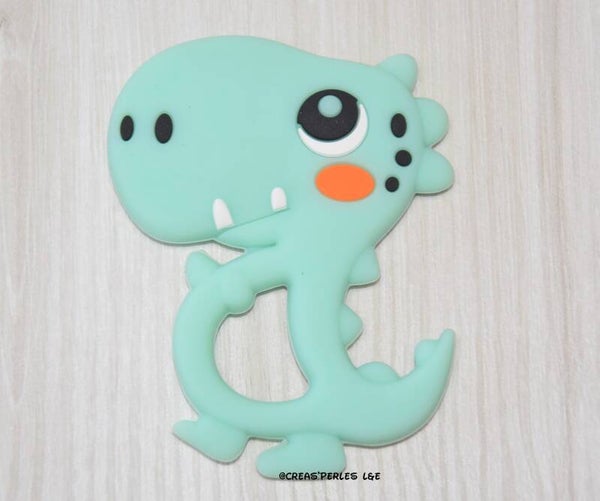 Anneau de dentition dinosaure A vert menthe