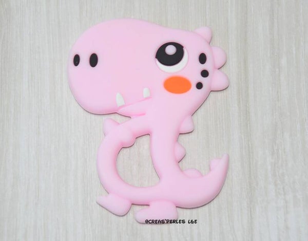 Anneau de dentition dinosaure A rose clair