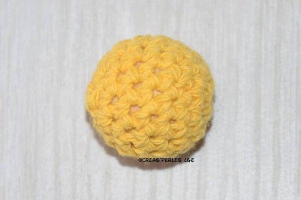 Boule en crochet jaune moutarde 20mm