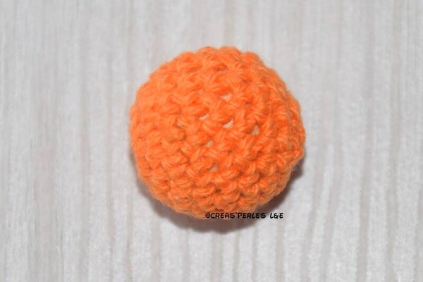 Boule en crochet orange 20mm