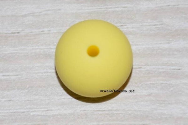 10 perles rondes silicone 9mm jaune clair