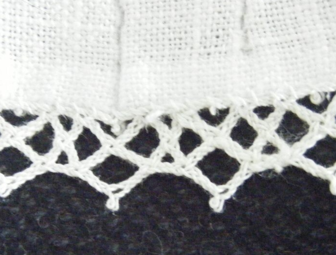 Hand made plaited bobbin lace