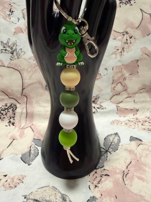 Schlüsselanhänger aus Silikonperlen (Dino)