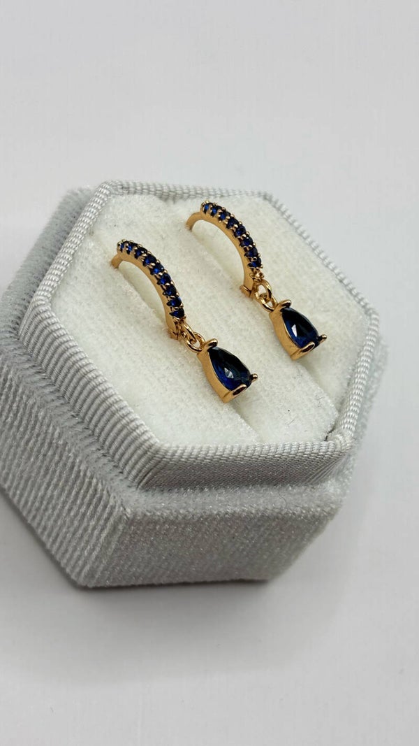 Hoops met druppeltje blauw