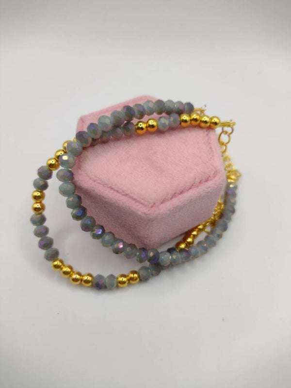 Goud/grijs/paarstinten